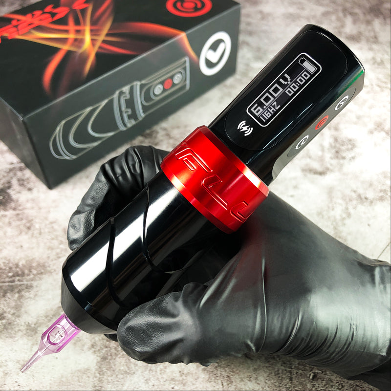 Close-up of FluxMax Wireless Pen Tattoo Machine in red color with adjustable voltage control.